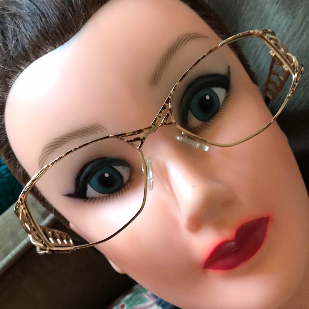 Vintage Cazal in gold with bronzy spattering. Very flattering and elegant. Deco!